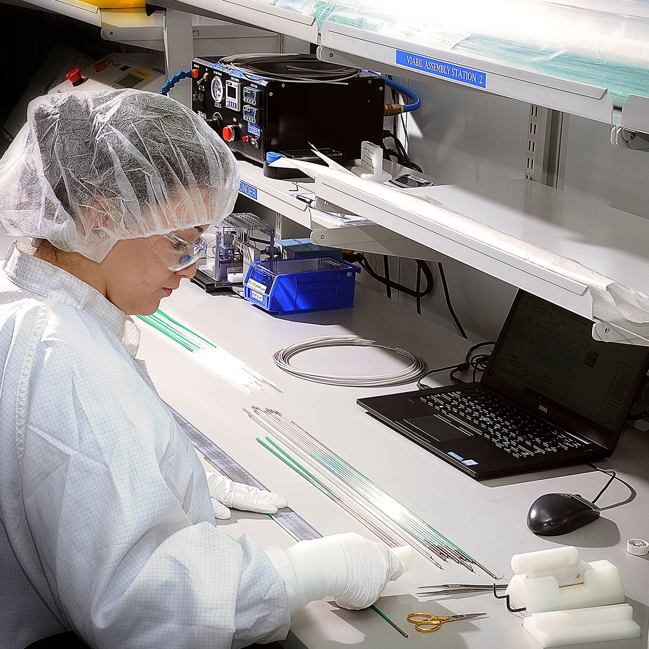 An SPG extrusion expert manufacturing catheter extrusions in a clean work area