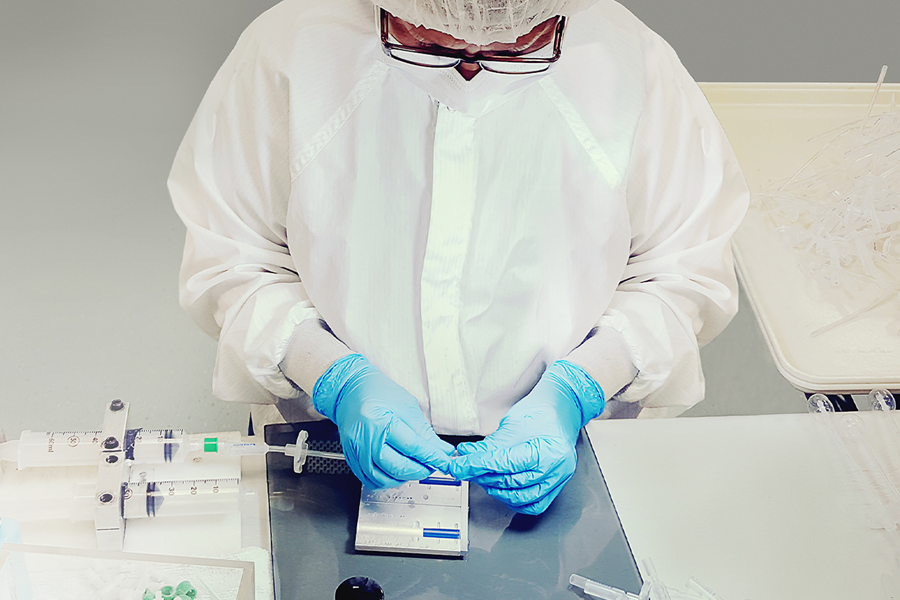 A Xeridiem technician working with silicone components